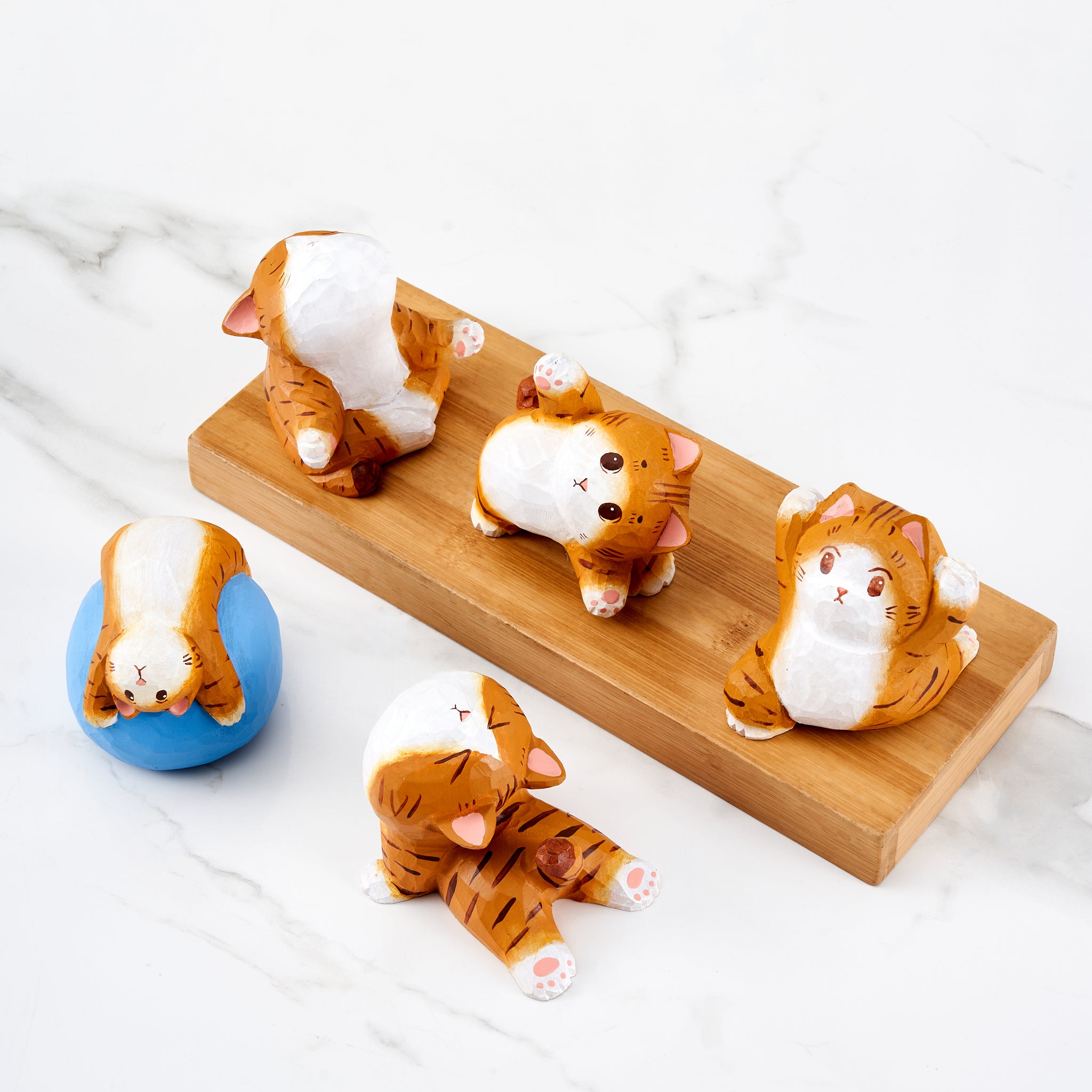 Yvie Carved Wooden Playful Cat in Wheel Pose – Mokuomo